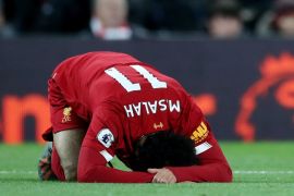 Soccer Football - Premier League - Liverpool v Manchester City - Anfield, Liverpool, Britain - November 10, 2019 Liverpool's Mohamed Salah reacts after sustaining an injury Action Images via Reuters/Carl Recine EDITORIAL USE ONLY. No use with unauthorized audio, video, data, fixture lists, club/league logos or