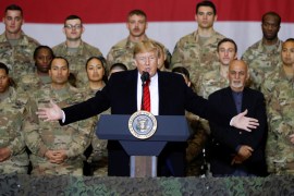 U.S. President Donald Trump delivers remarks to U.S. troops, with Afghanistan President Ashraf Ghani standing behind him, during an unannounced visit to Bagram Air Base, Afghanistan, November 28, 2019. REUTERS/Tom Brenner TPX IMAGES OF THE DAY