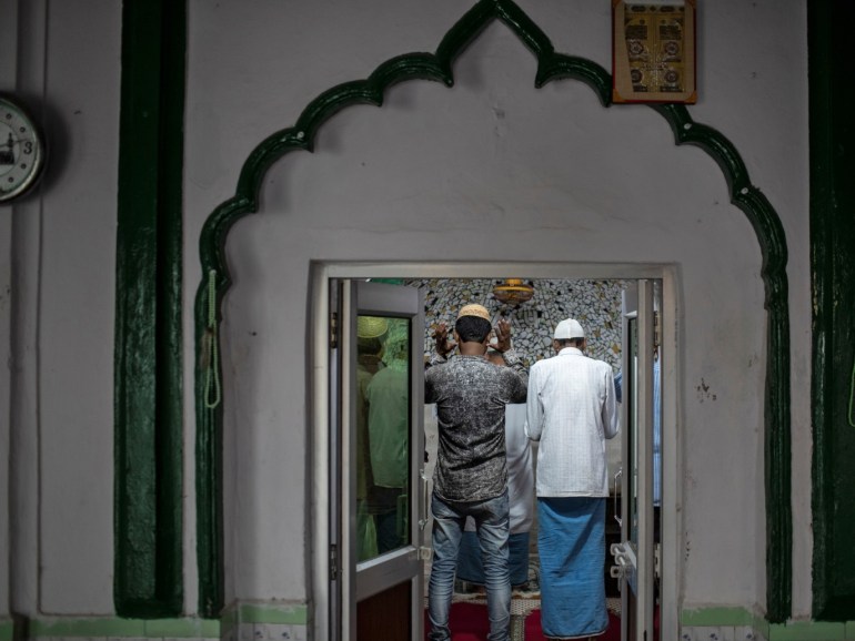 Muslims pray inside a mosque after Supreme Court's verdict on a disputed religious site, in Ayodhya, India, November 10, 2019. REUTERS/Danish Siddiqui