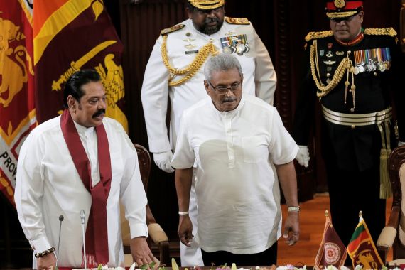Sri Lanka's President Gotabaya Rajapaksa and his brother and former leader Mahinda Rajapaksa, who was appointed as the new Prime Minister, look on during the swearing in ceremony in Colombo, Sri Lanka November 21, 2019. REUTERS/Dinuka Liyanawatte