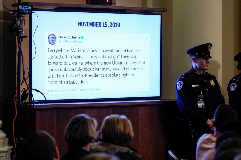 A tweet from U.S. President Donald Trump about U.S. Ambassador to Ukraine Marie Yovanovitch is displayed during her testimony before the House Intelligence Committee hearing as part of the impeachment inquiry into U.S. President Donald Trump on Capitol Hill in Washington, Washington, U.S., November 15, 2019. REUTERS/Joshua Roberts/Pool