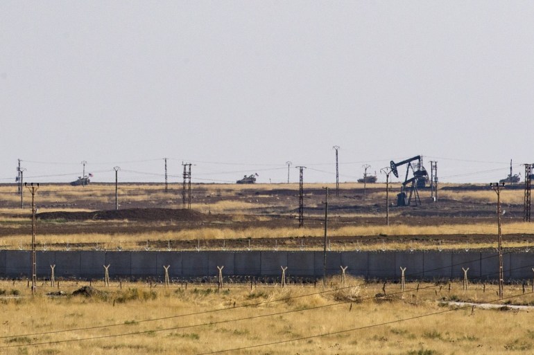US resumes patrol at oil reservoir in NE Syria- - MARDIN, TURKEY - NOVEMBER 01: A photo taken from Mardin province of Turkey shows U.S. troops on November 01, 2019 resumed military patrols around oil reservoirs in northeastern Syria.
