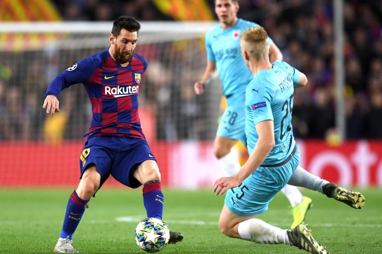BARCELONA, SPAIN - NOVEMBER 05: Lionel Messi of FC Barcelona is challenged by Michal Frydrych of Slavia Praha during the UEFA Champions League group F match between FC Barcelona and Slavia Praha at Camp Nou on November 05, 2019 in Barcelona, Spain. (Photo by Alex Caparros/Getty Images)