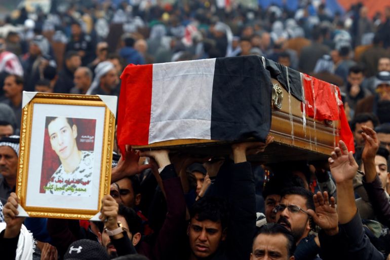 Mourners carry the coffin during the funeral of a demonstrator who was killed at an anti-government protest overnight in Najaf, Iraq November 29, 2019. REUTERS/Alaa al-Marjani