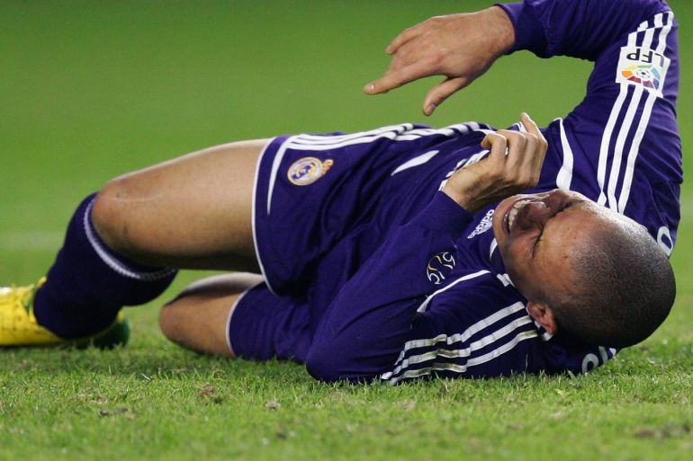 SEVILLE, SPAIN - DECEMBER 09: Ronaldo of Real Madrid lies injured during the Primera Liga match between Sevilla and Real Madrid at the Sanchez Pizjuan stadium on December 9, 2006 in Seville, Spain. (Photo by Denis Doyle/Getty Images)