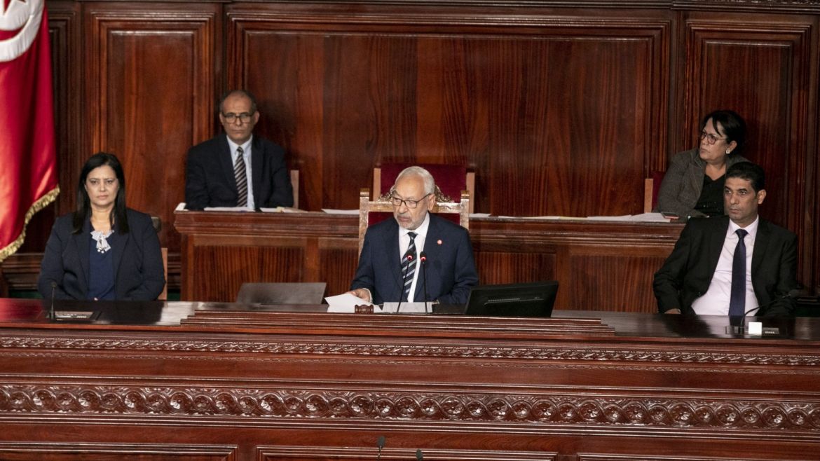 Leader of Nahda Movement Rachid al-Ghannouchi- - TUNIS, TUNISIA - NOVEMBER 14: Leader of Nahda Movement Rachid al-Ghannouchi (C) speaks during a session in the Tunisian parliament in Tunis, Tunisia on November 14, 2019.