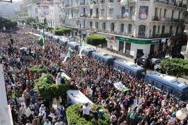 Protest in Algeria- - ALGIERS, ALGERIA - NOVEMBER 01: Algerians take part in an anti-government demonstration against Bouteflika regime figures in Algiers, Algeria on November 1, 2019. Demonstrations coincided with official celebrations of the Algerian revolution against French colonialism on Nov. 1, 1954.