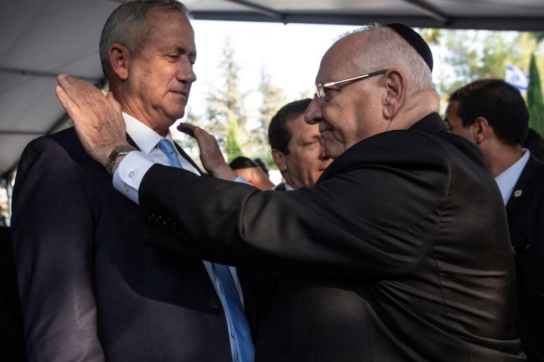 Head of Blue and White Party Benny Gantz and Israeli President Reuven Rivlin attend a memorial ceremony for the late Prime Minister Yitzhak Rabin at Mount Herzl military cemetery in Jerusalem as Israel marks the 24th anniversary of Rabin's killing by an ultra-nationalist Jewish assassin, November 10, 2019. Heidi Levine/Pool via REUTERS