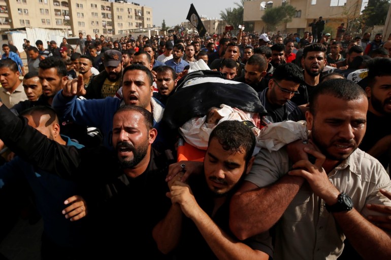 SENSITIVE MATERIAL. THIS IMAGE MAY OFFEND OR DISTURB Mourners carry the body of Palestinian Islamic Jihad militant Abdullah al-Belbasi during his funeral in the northern GazaStrip November 13, 2019. REUTERS/Mohammed Salem