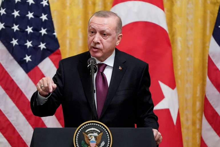 Turkey's President Tayyip Erdogan answers questions during a joint news conference with U.S. President Donald Trump at the White House in Washington, U.S., November 13, 2019. REUTERS/Joshua Roberts