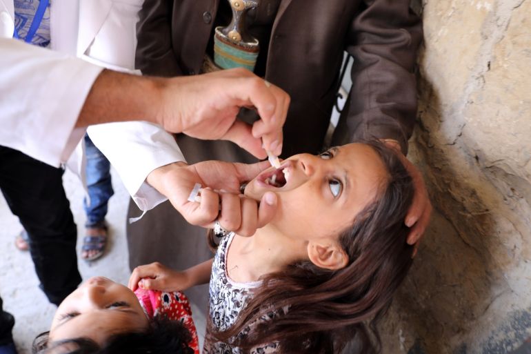 A girl is administered with a cholera vaccine during a house-to-house vaccination campaign in Sanaa, Yemen September 14, 2019. REUTERS/Khaled Abdullah