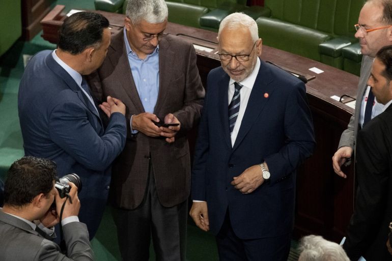 Leader of Nahda Movement Rachid al-Ghannouchi- - TUNIS, TUNISIA - NOVEMBER 14: Leader of Nahda Movement Rachid al-Ghannouchi (C) attends a session in the Tunisian parliament in Tunis, Tunisia on November 14, 2019.