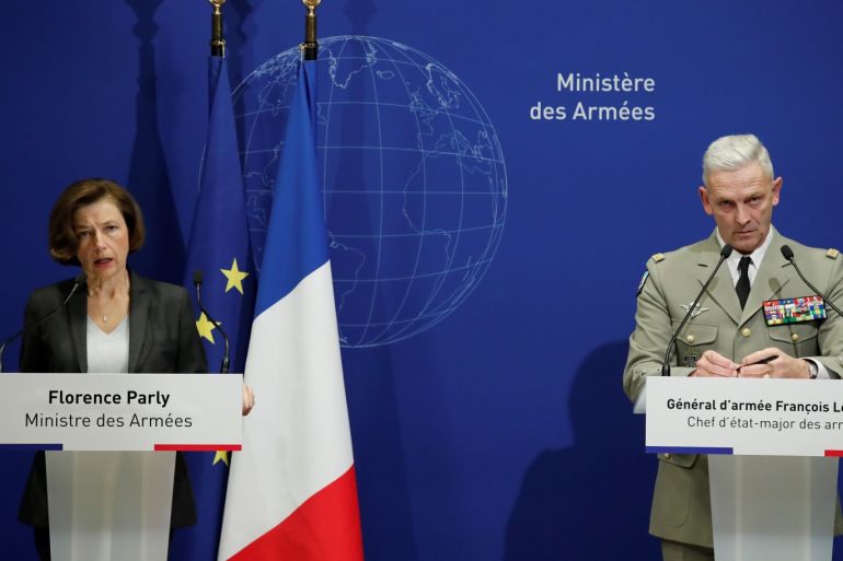 French Defense Minister Florence Parly and Chief of the Defense Staff of the French Army General Francois Lecointre attend a news conference in Paris, France, after thirteen French soldiers were killed in Mali when their helicopters collided at low altitude as they swooped in to support ground forces engaged in combat with Islamist militants. REUTERS/Benoit Tessier