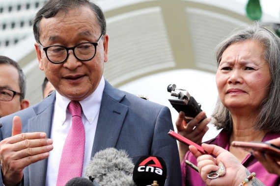 Self-exiled Cambodian opposition party founder Sam Rainsy and Mu Sochua, Deputy President of the Cambodia National Rescue Party (CNRP), speak to members of the media after leaving the Parliament House in Kuala Lumpur, Malaysia, November 12, 2019. REUTERS/Lim Huey Teng