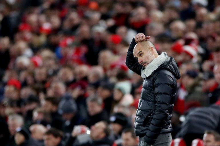 Soccer Football - Premier League - Liverpool v Manchester City - Anfield, Liverpool, Britain - November 10, 2019 Manchester City manager Pep Guardiola reacts Action Images via Reuters/Carl Recine EDITORIAL USE ONLY. No use with unauthorized audio, video, data, fixture lists, club/league logos or