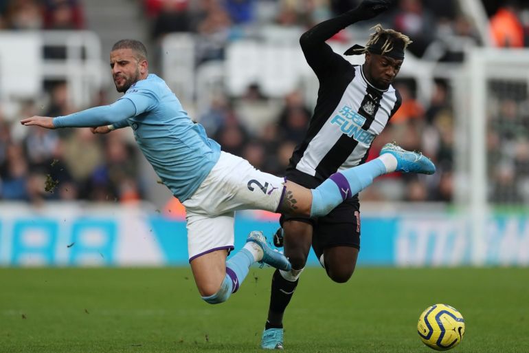 Soccer Football - Premier League - Newcastle United v Manchester City - St James' Park, Newcastle, Britain - November 30, 2019 Newcastle United's Allan Saint-Maximin in action with Manchester City's Kyle Walker Action Images via Reuters/Lee Smith EDITORIAL USE ONLY. No use with unauthorized audio, video, data, fixture lists, club/league logos or
