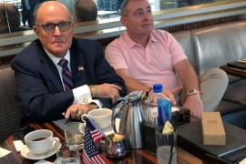 U.S. President Trump's personal lawyer Rudy Giuliani has coffee with Ukrainian-American businessman Lev Parnas at the Trump International Hotel in Washington, U.S. September 20, 2019. REUTERS/Aram Roston