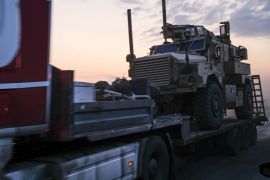 SHEIKHAN, IRAQ - OCTOBER 19: A convoy of U.S. armored military vehicles leave Syria on a road to Iraq on October 19, 2019 in Sheikhan, Iraq. Refugees fleeing the Turkish incursion into Syria arrived in Northern Iraq since the conflict began, with many saying they paid to be smuggled through the Syrian border. (Photo by Byron Smith/Getty Images)