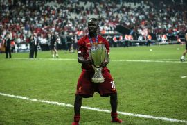 Liverpool v Chelsea: UEFA Super Cup- - ISTANBUL, TURKEY - AUGUST 15: Sadio Mane holds the trophy as Liverpool celebrate winning the 2019 UEFA Super Cup final by beating Chelsea 5-4 on penalties at Vodafone Park in Istanbul, Turkey on August 15, 2019.