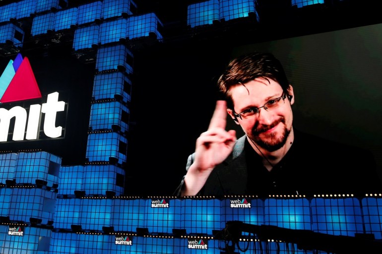 Edward Snowden gestures as he speaks via livestream at Web Summit in Lisbon, Portugal, November 4, 2019. REUTERS/Rafael Marchante