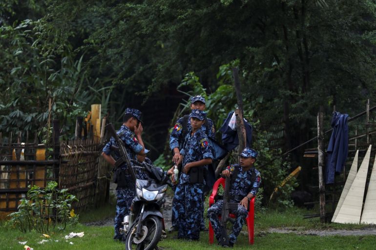 Myanmar soldiers stand guard near the area, where Indian and Myanmar governments built new houses, in Maungdaw, Rakhine, Myanmar, July 9, 2019. Picture taken July 9, 2019. REUTERS/Ann Wang