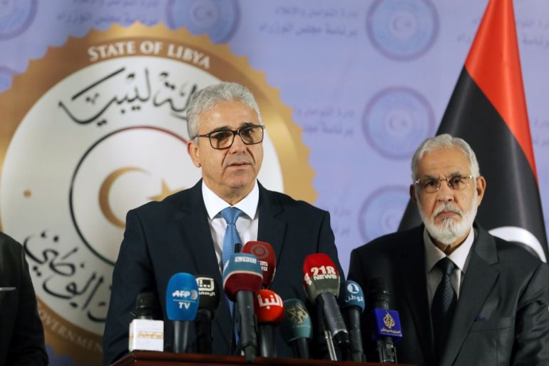 Interior Minister Fathi Ali Bashagha (C) speaks during a joint news conference with Foreign Minister Mohamed Taher Siala in Tripoli, Libya December 25, 2018. REUTERS/Hani Amara