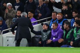 LONDON, ENGLAND - NOVEMBER 26: Manager of Spurs Jose Mourinho thanks the ball kid who help set up a goal during the UEFA Champions League group B match between Tottenham Hotspur and Olympiacos FC at Tottenham Hotspur Stadium on November 26, 2019 in London, United Kingdom. (Photo by Julian Finney/Getty Images)