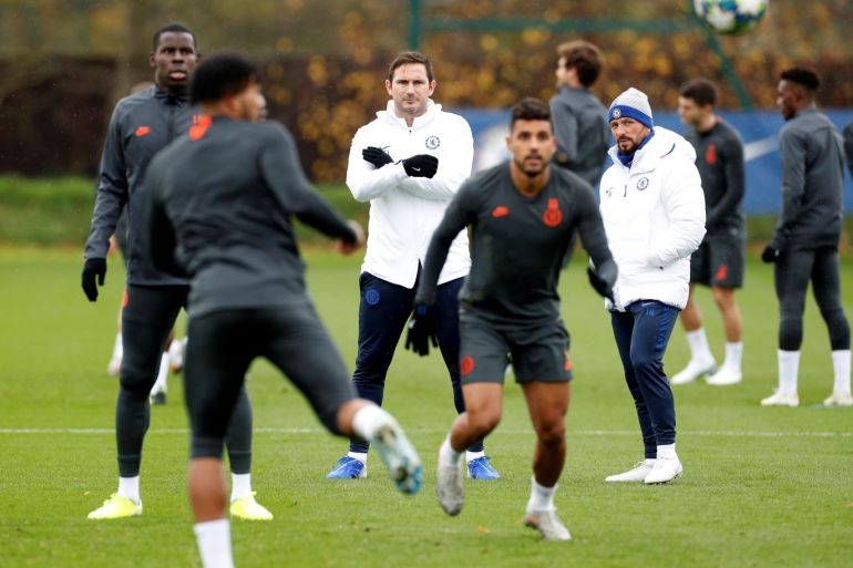 Soccer Football - Champions League - Chelsea Training - Cobham Training Centre, Stoke D'Abernon, Cobham, Britain - November 4, 2019 Chelsea manager Frank Lampard and assistant manager Jody Morris during training Action Images via Reuters/John Sibley