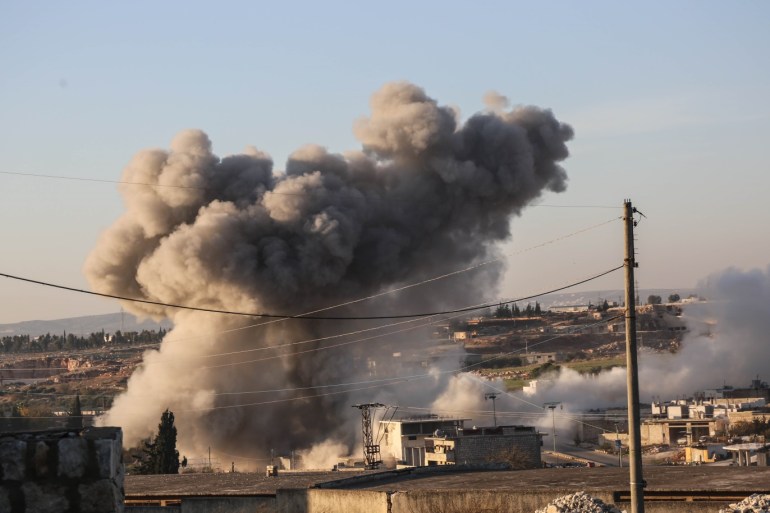 Airstrikes continue to hit Idlib- - IDLIB, SYRIA - DECEMBER 18: Smoke rises after warplanes belonging to Assad Regime hit Ma'arat al-Nu'man district of Idlib, de-escalation zone, Syria on December 18, 2019.