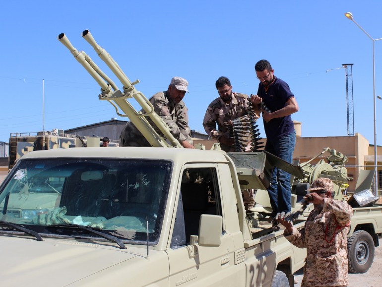 Members of the Libyan internationally recognised government forces prepare ammunition to head out from Misrata to the front line in Tripoli, Misrata, Libya May 9, 2019. Picture taken May 9, 2019. REUTERS/Ayman Al-Sahili