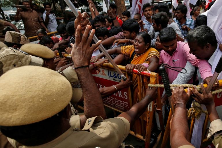Police officers stop demonstrators during a protest against a new citizenship law, in Chennai, India, December 21, 2019. REUTERS/P. Ravikumar