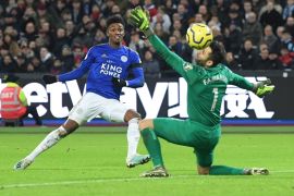 LONDON, ENGLAND - DECEMBER 28: Demarai Gray of Leicester City scores his sides second goal past Lukasz Fabianski of West Ham Unitedduring the Premier League match between West Ham United and Leicester City at London Stadium on December 28, 2019 in London, United Kingdom. (Photo by Michael Regan/Getty Images)