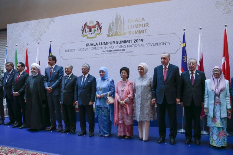 President of Turkey Recep Tayyip Erdogan in Malaysia - - KUALA LUMPUR, MALAYSIA - DECEMBER 19: President of Turkey, Recep Tayyip Erdogan (4th R) and his wife Emine Erdogan (5th R) take part in a family photo with other participant heads of state and government at Kuala Lumpur Summit at Kuala Lumpur Convention Centre on December 19, 2019 in Kuala Lumpur, Malaysia.