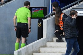 BARCELONA, SPAIN - DECEMBER 01: Referee Mario Lopez checks the VAR screen before he awards a penalty to Espanyol during the La Liga match between RCD Espanyol and CA Osasuna at RCDE Stadium on December 01, 2019 in Barcelona, Spain. (Photo by David Ramos/Getty Images)