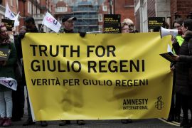 Demonstrators from Amnesty International hold placards outside the Egyptian embassy in support of Giulio Regeni, who was found murdered in Cairo two years ago, in London, Britain, February 2, 2018. REUTERS/Simon Dawson
