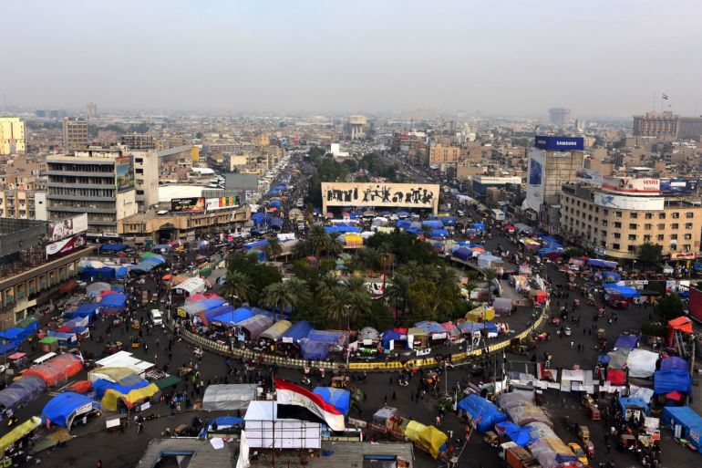 epaselect epa08075907 Iraqi protesters gather during the ongoing protests at the Al Tahrir square in central Baghdad, Iraq, 16 December 2019. Protests continue in Baghdad and southern Iraqi cities since October 2019 with rising casualties of more than 300 people, while protesters are calling for the resignation of all senior officials in the country after Prime Minister Adel Abdul Mahdi stepped down. EPA-EFE/MURTAJA LATEEF