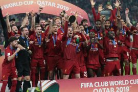 Liverpool FC vs CR Flamengo - FIFA Club World Cup Qatar 2019- - DOHA, QATAR - DECEMBER 21: Players of Liverpool lift the trophy during a ceremony at the end of the FIFA Club World Cup Qatar 2019 Final match between Liverpool FC and CR Flamengo at Khalifa International Stadium in Doha, Qatar on December 21, 2019.