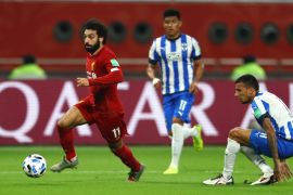 DOHA, QATAR - DECEMBER 18: Mohamed Salah of Liverpool breaks away from Leonel Vangioni of C.F. Monterrey during the FIFA Club World Cup semi-final match between Monterrey and Liverpool at Education City Stadium on December 18, 2019 in Doha, Qatar. (Photo by Francois Nel/Getty Images)