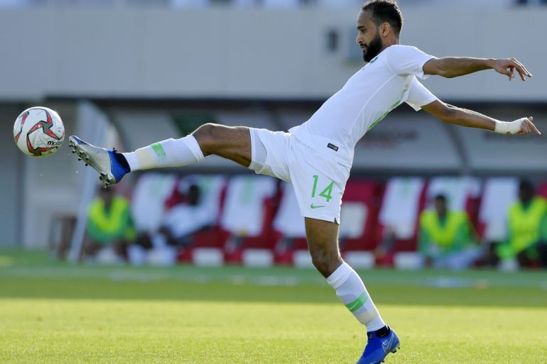 SHARJAH, UNITED ARAB EMIRATES - JANUARY 21: Abdullah Otayf of Saudi Arabia in action during the AFC Asian Cup round of 16 match between Japan and Saudi Arabia at Sharjah Stadium on January 21, 2019 in Sharjah, United Arab Emirates. (Photo by Koki Nagahama/Getty Images)