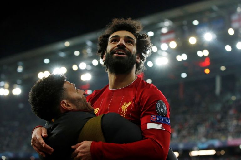 Soccer Football - Champions League - Group E - FC Salzburg v Liverpool - Red Bull Arena Salzburg, Salzburg, Austria - December 10, 2019 Liverpool's Mohamed Salah celebrates scoring their second goal with Alex Oxlade-Chamberlain Action Images via Reuters/John Sibley TPX IMAGES OF THE DAY