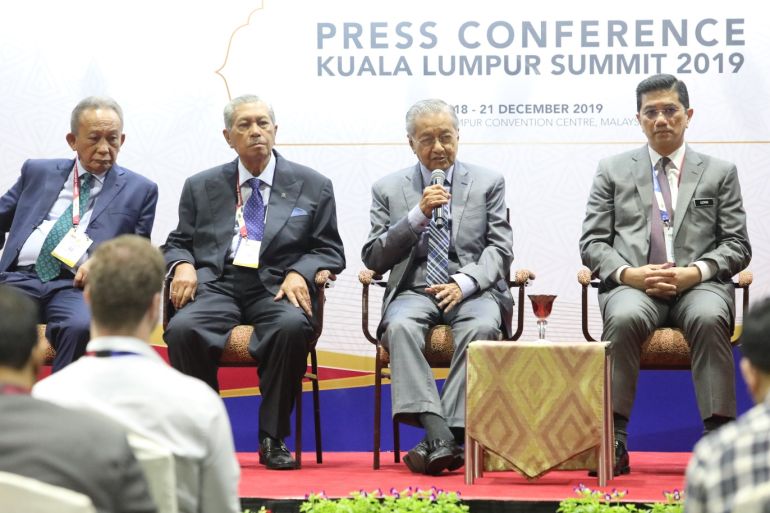 Closing ceremony of Kuala Lumpur Summit 2019- - KUALA LUMPUR, MALAYSIA - DECEMBER 21:Malaysian Prime Minister Tun Mahathir Mohammad (2R) is seen answering questions from local and foreign media after the closing ceremony of Kuala Lumpur Summit 2019 on December 21, 2019 in Kuala Lumpur, Malaysia. The objective of KL Summit 2019 is to be a leading force in shaping and restoring Islamic civilization.