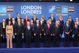 NATO Leaders' Summit in London- - LONDON, UNITED KINGDOM - DECEMBER 04: (front row ) Britain's Prime Minister Boris Johnson (C), NATO Secretary General Jens Stoltenberg(C-R), US President Donald Trump (5th R) and President of Turkey Recep Tayyip Erdogan (4th R) , (middle row) France's President Emmanuel Macron, German Chancellor Angela Merkel, Greek Prime Minister Kyriakos Mitsotakis, Hungary's Prime Minister Viktor Orban, Iceland's Prime Minister Katrin Jakobsdo