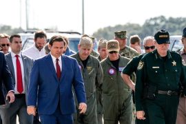 PENSACOLA, FLORIDA - DECEMBER 06: Florida Governor Ron DeSantis (C) arrives for a press conference following a shooting on the Pensacola Naval Air Base on December 06, 2019 in Pensacola, Florida. The second shooting on a U.S. Naval Base in a week has left three dead plus the suspect and seven people wounded. Josh Brasted/Getty Images/AFP== FOR NEWSPAPERS, INTERNET, TELCOS & TELEVISION USE ONLY ==