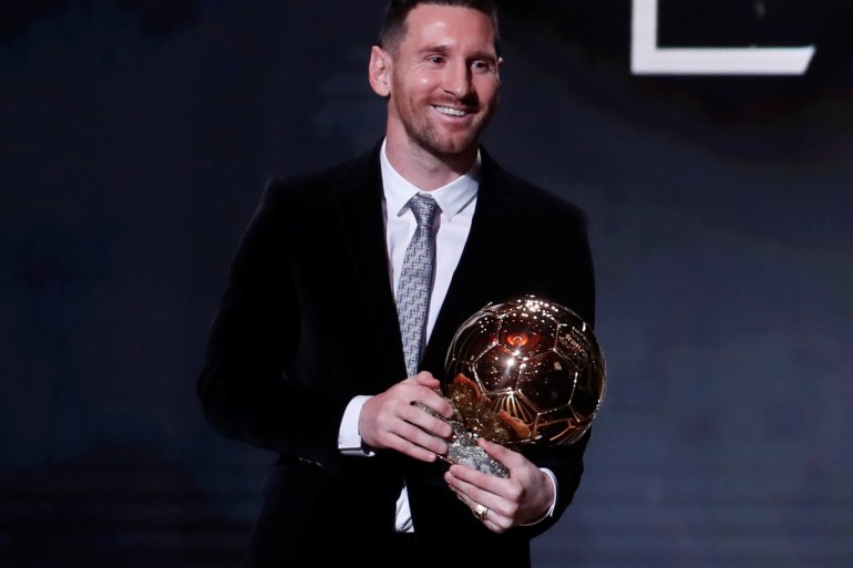 Soccer Football - The Ballon d’Or awards - Theatre du Chatelet, Paris, France - December 2, 2019 Barcelona's Lionel Messi with the Ballon d'Or award REUTERS/Christian Hartmann