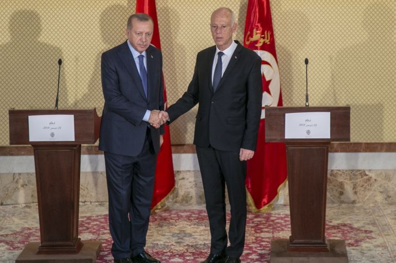 President of Turkey, Recep Tayyip Erdogan in Tunisia- - TUNIS, TUNISIA - DECEMBER 25: President of Turkey, Recep Tayyip Erdogan (L) and Tunisian President Kais Saied (R) hold a joint press conference following their meeting in Tunis, Tunisia on December 25, 2019.