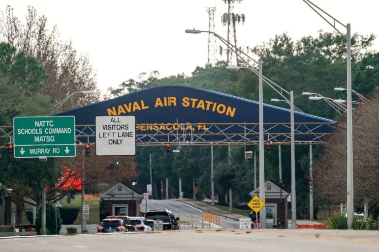 PENSACOLA, FLORIDA - DECEMBER 06: A general view of the atmosphere at the Pensacola Naval Air Station main gate following a shooting on December 06, 2019 in Pensacola, Florida. The second shooting on a U.S. Naval Base in a week has left three dead plus the suspect and seven people wounded. Josh Brasted/Getty Images/AFP== FOR NEWSPAPERS, INTERNET, TELCOS & TELEVISION USE ONLY ==