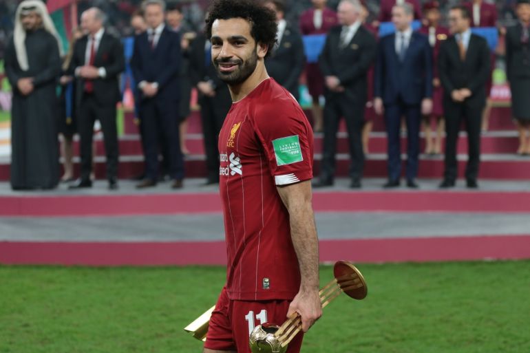 Liverpool FC vs CR Flamengo - FIFA Club World Cup Qatar 2019- - DOHA, QATAR - DECEMBER 21: Mohamed Salah of Liverpool poses for a photo after he was named best player in the tournament during the cup ceremony at the end of the FIFA Club World Cup Qatar 2019 Final match between Liverpool FC and CR Flamengo at Khalifa International Stadium in Doha, Qatar on December 21, 2019.
