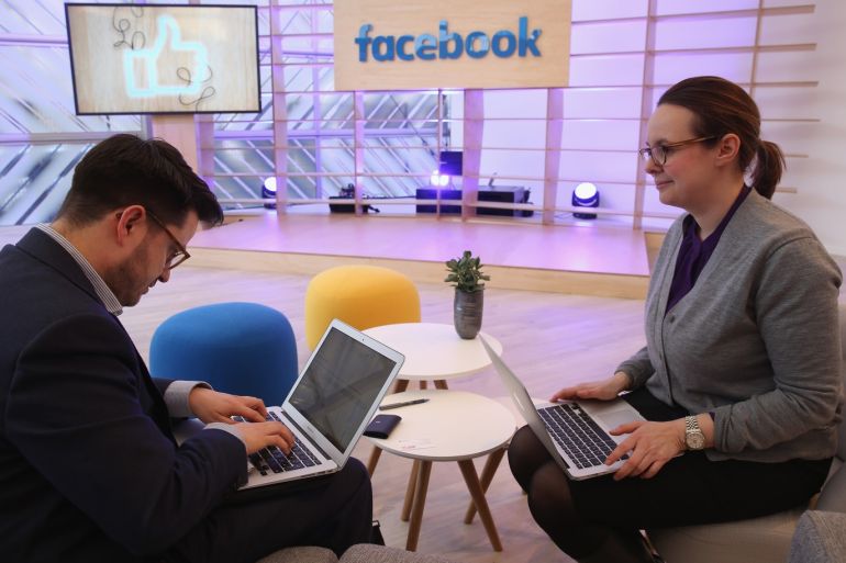 BERLIN, GERMANY - FEBRUARY 24: Two PR agency employees work on computers at the Facebook Innovation Hub on February 24, 2016 in Berlin, Germany. The Facebook Innovation Hub is a temporary exhibition space where the company is showcasing some of its newest technologies and projects. (Photo by Sean Gallup/Getty Images)