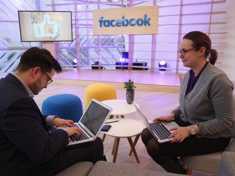 BERLIN, GERMANY - FEBRUARY 24: Two PR agency employees work on computers at the Facebook Innovation Hub on February 24, 2016 in Berlin, Germany. The Facebook Innovation Hub is a temporary exhibition space where the company is showcasing some of its newest technologies and projects. (Photo by Sean Gallup/Getty Images)