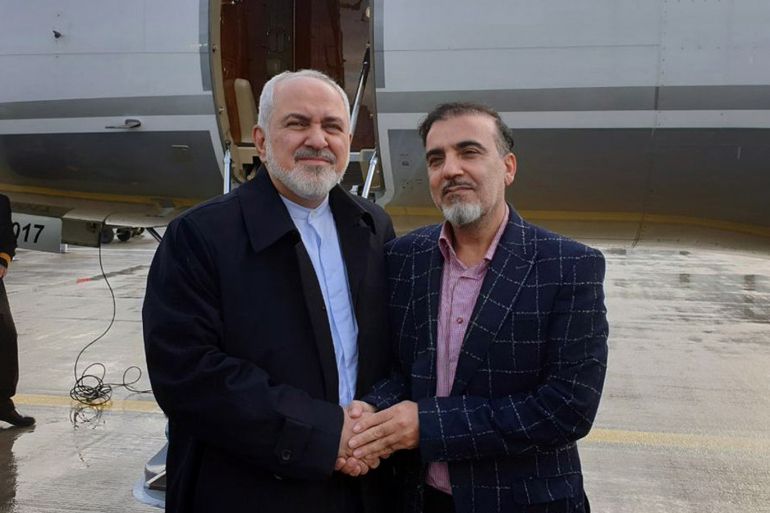 epa08051113 A handout photo made available by Iranian Foreign Affairs Minister Mohammad Javad Zarif's twitter account on 07 December2019 shows Zarif (L) greeting Iranian researcher Masoud Soleimani at an undisclosed airport in Switzerland. Iranian Foreign Minister Mohammad Javad Zarif announced on 07 December 2019 that Iranian stem-cell researcher Masoud Soleimani has been released after over a year in jail in the US as part of a prisoner swap deal between Tehran and Washington. US student Xiyue Wang, 38, who was held in an Iranian prison for more than three years, was headed home as part of the deal between the two countries, media reported. EPA-EFE/IRANIAN FOREGIN MINISTRY HANDOUT HANDOUT EDITORIAL USE ONLY/NO SALES
